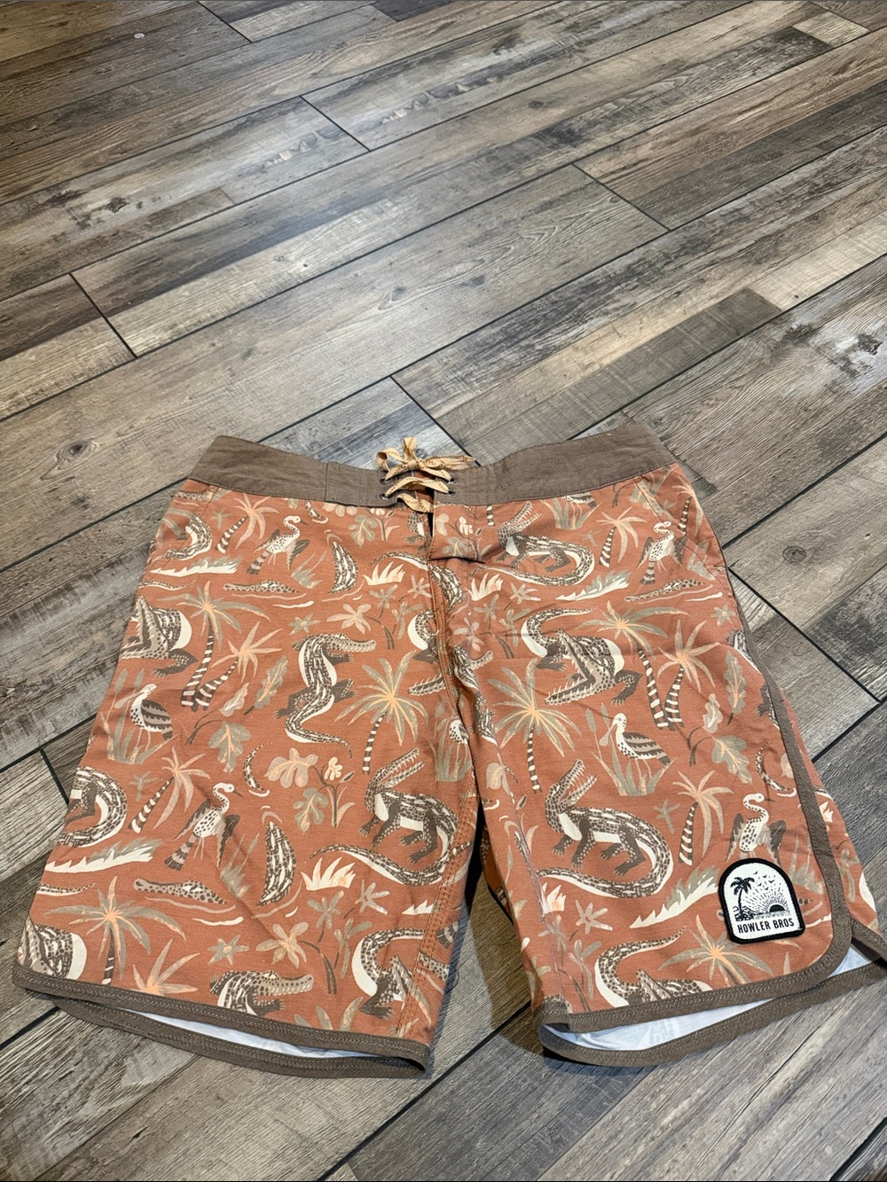 Howler Brothers Men's Rust Tropical Print Board Shorts with Brown Trim